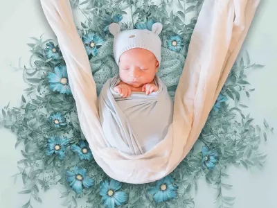 newborn-neonato-composizione-floreale-cerchio-sicilia.webp