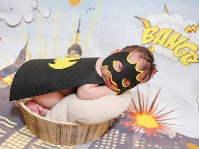 newborn-neonato-tema-batman-posa-creativa-agrigento.webp